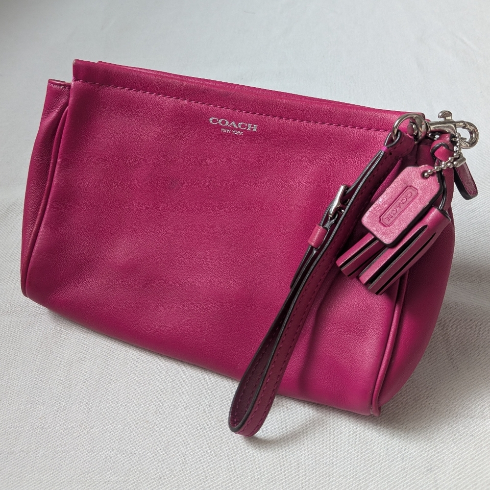 Coach Adult Pink Leather Zip Closure Wristlet With Leather Tassels